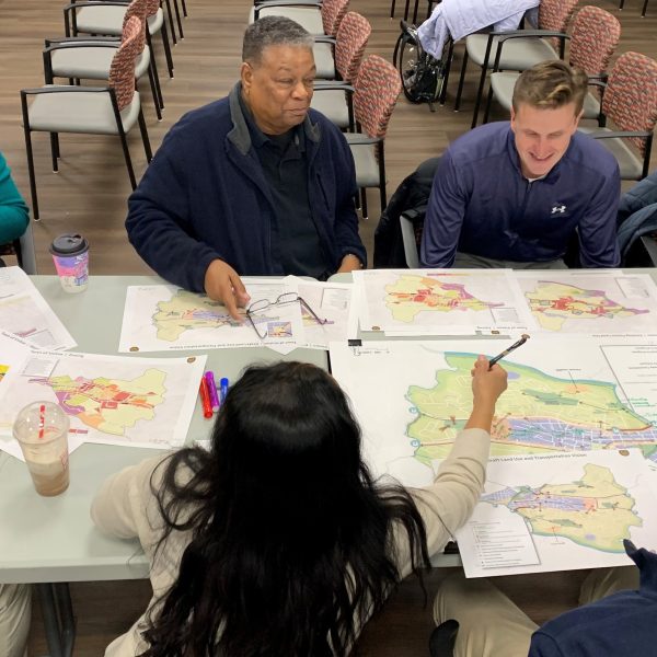 People discussing around a table
