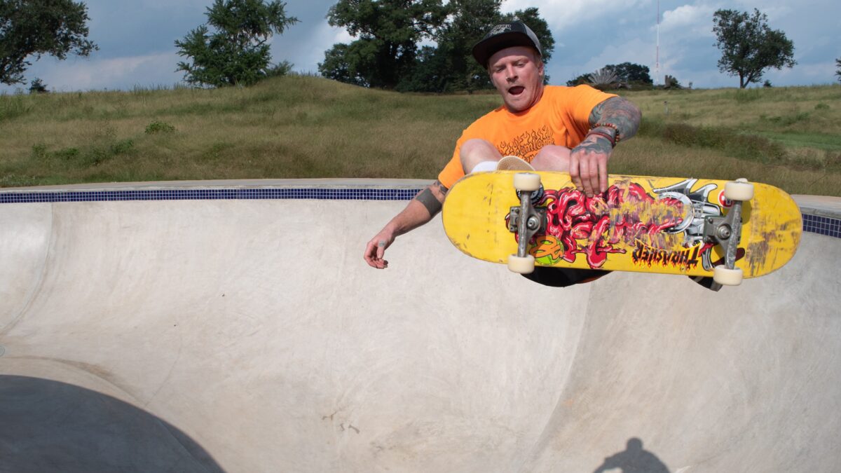 man in air skateboarding