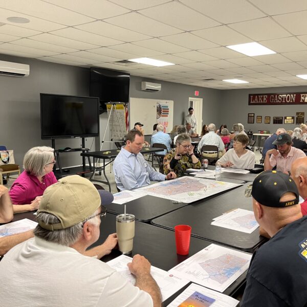 people meeting around tables