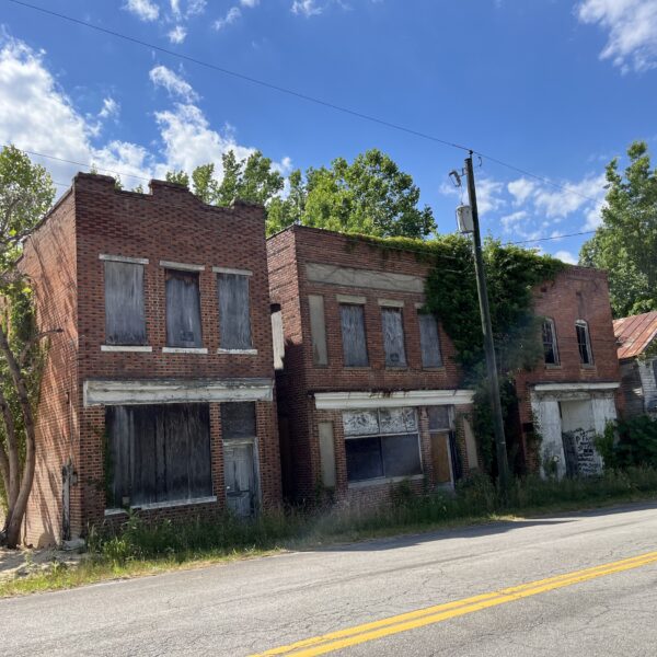 abandoned brick buildings boarded up